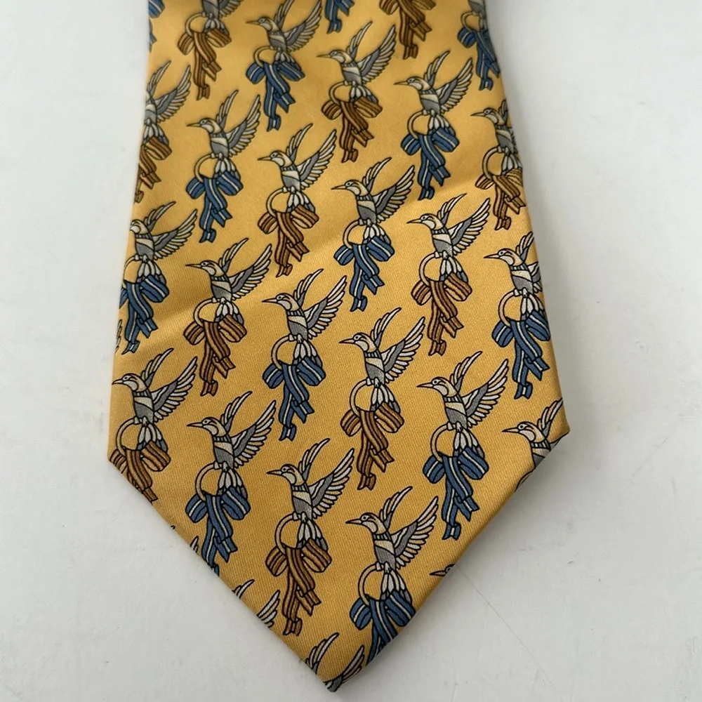 Salvatore Ferragamo 100% Silk yellow tie with birds pattern blue / yellow tones